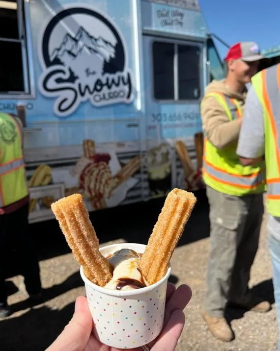 The Snowy Churro food truck serving guests at a Colorado event